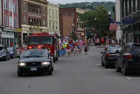 saranac lake department engine parade lead police annual children down kiddie during street main