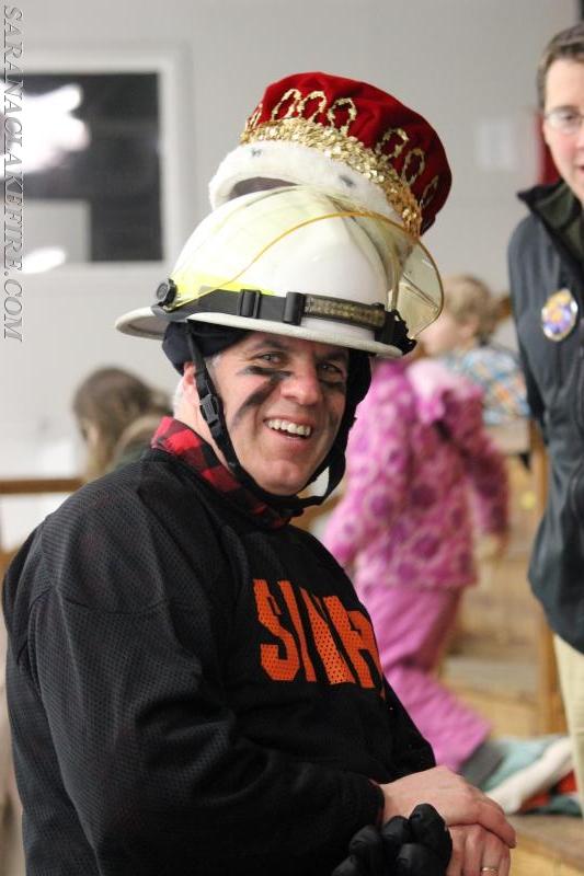 2016 Winter Carnival King and Chief of the SLVFD Brendan Keough did not let his crown interfere with his fire department duty on the Broom Ball Team.