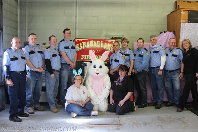 Members and the Easter Bunny pose for photo with sponsor Hyde Fuel and Nice-n-Easy.