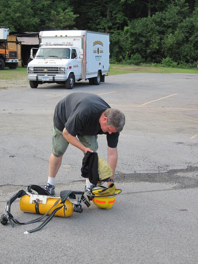 Craig Barry prepares for Donning Drill 8/11/2010