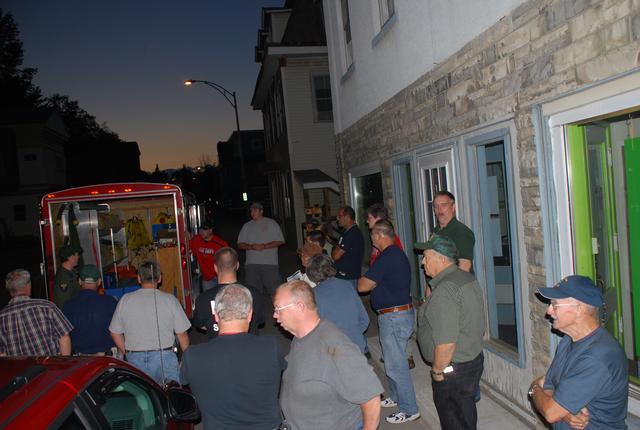 Forest Ranger Pete Evans displays wildland firefighting equipment to SLVFD members during fire school at the SLVFD fire house 7/29/2010