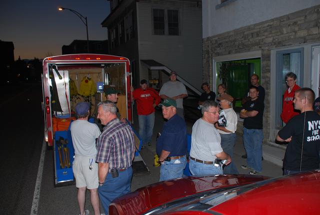 Forest Ranger Pete Evans displays wildland firefighting equipment to SLVFD members during fire school at the SLVFD fire house 7/29/2010