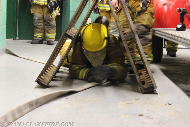 Air Pack, obstacle, and self rescue training at the Saranac Lake fire station. 