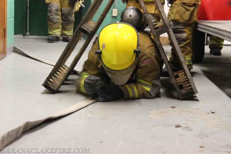 Air Pack, obstacle, and self rescue training at the Saranac Lake fire station. 